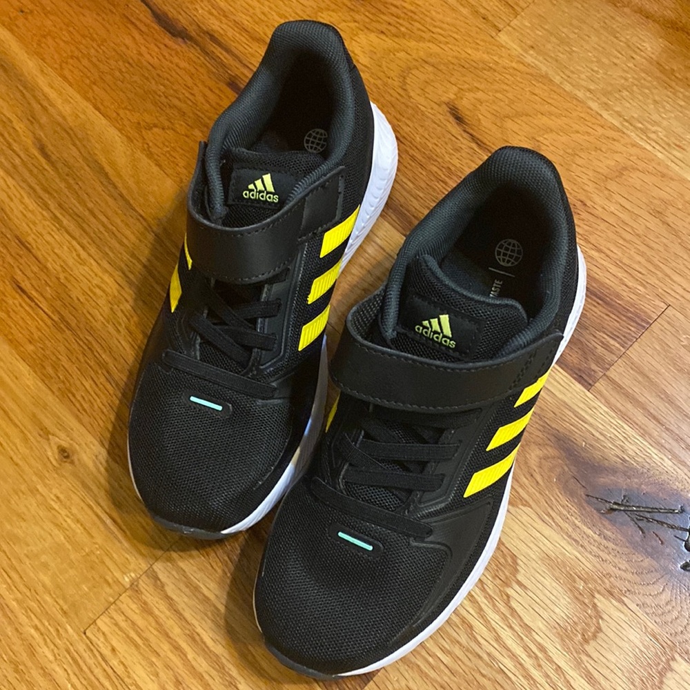 Adidas tennis shoes size 1 in brand new condition